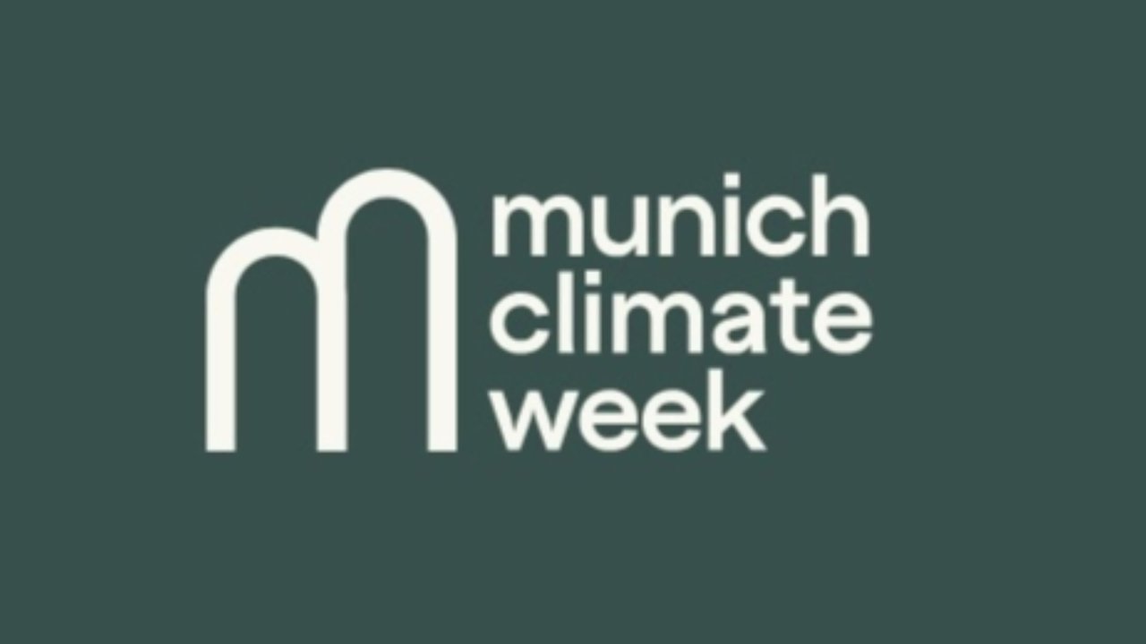 Logo for Munich Climate Week on a dark green background.